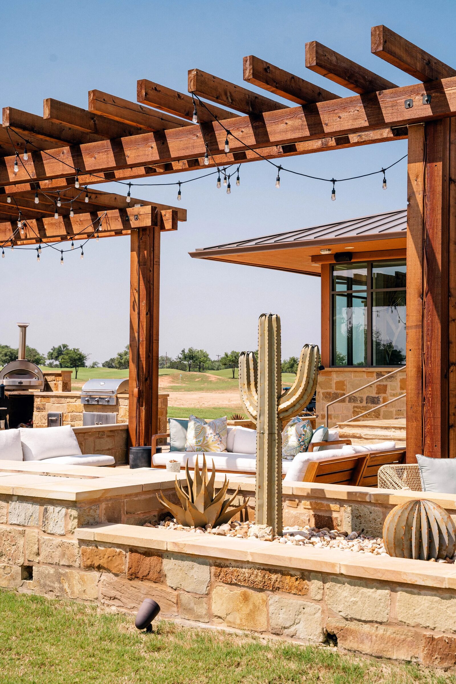 The Lakecliff patio at sunset with string lights